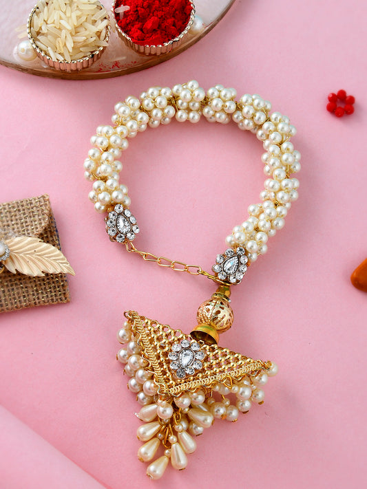 Aapno Rajasthan Pearl and American Diamonds Golden Bangle style Lumba Rakhi - Only Rakhi (LM1912_J23)