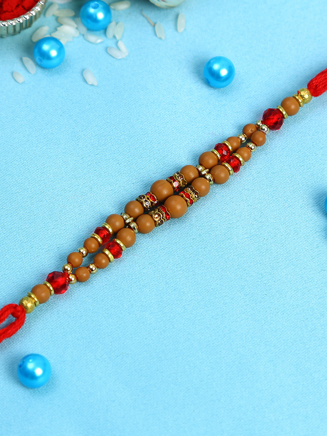 Auspicious Wooden Beaded Rakhi with Golden Rings - Only Rakhi (PRS2231)