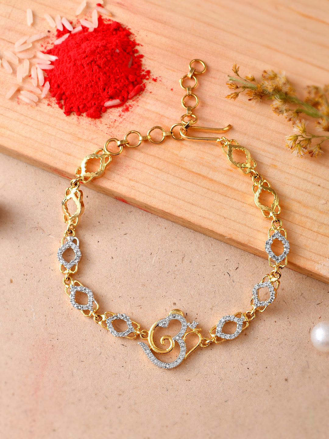 Gold Plated Om Engraved Majestic Bracelet Rakhi - Only Rakhi (PRS23101)