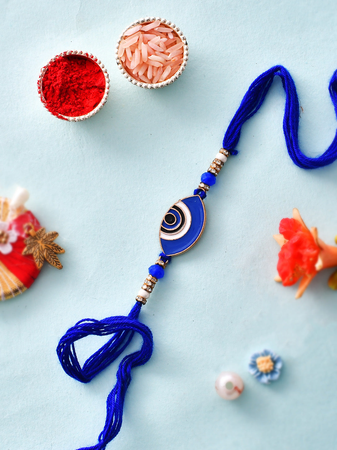 Ceramic Enamled Indigo Nazar Rakshak Rakhi - Only Rakhi (PRS23141)