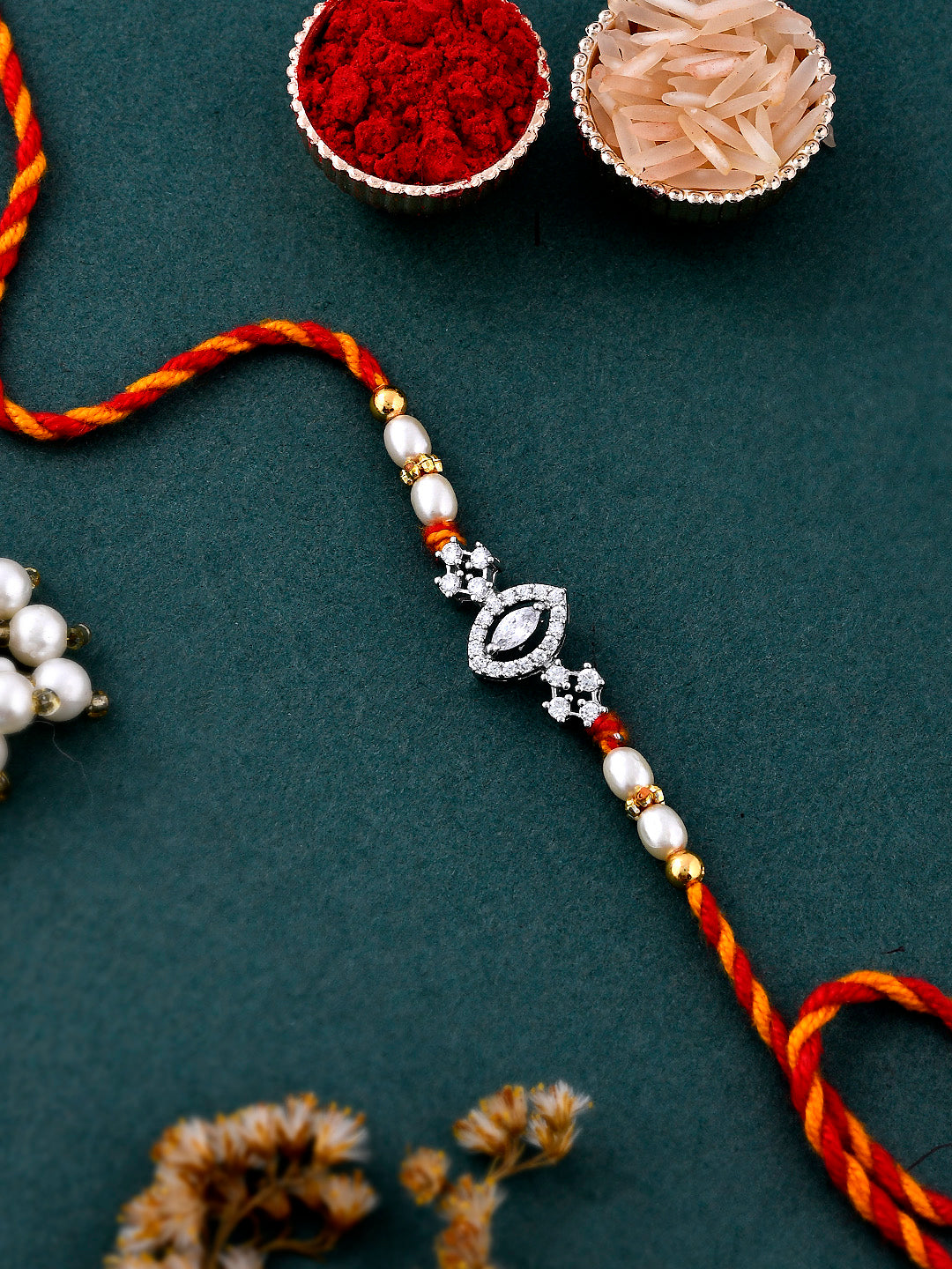 American Diamond Studded Exquisite Braided Leaf Shape Silver Rakhi - Only Rakhi (PRS23178)