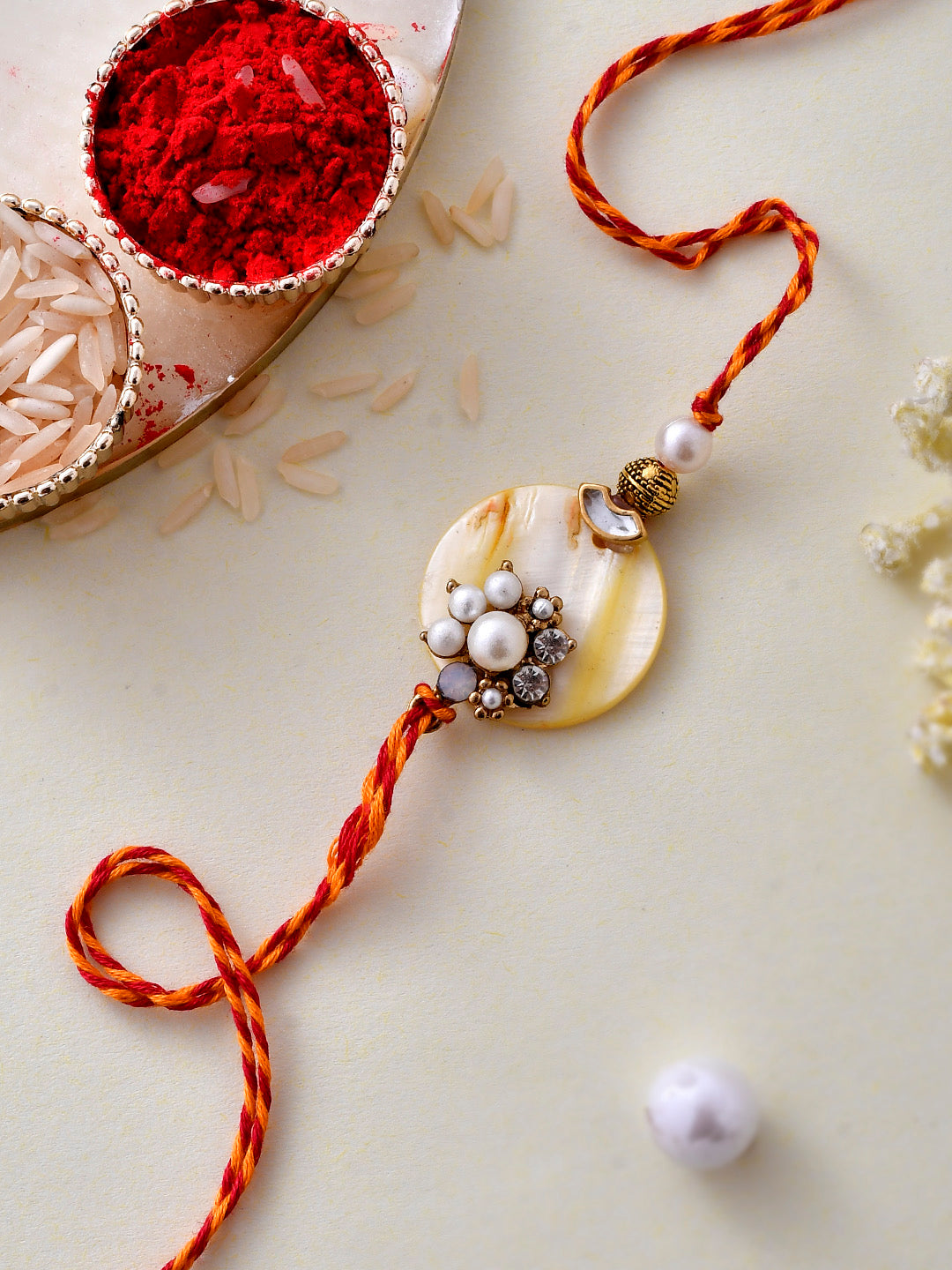 Elegant Pearl and Beads Enameled Resin Rakhi - Only Rakhi (PRS2321)