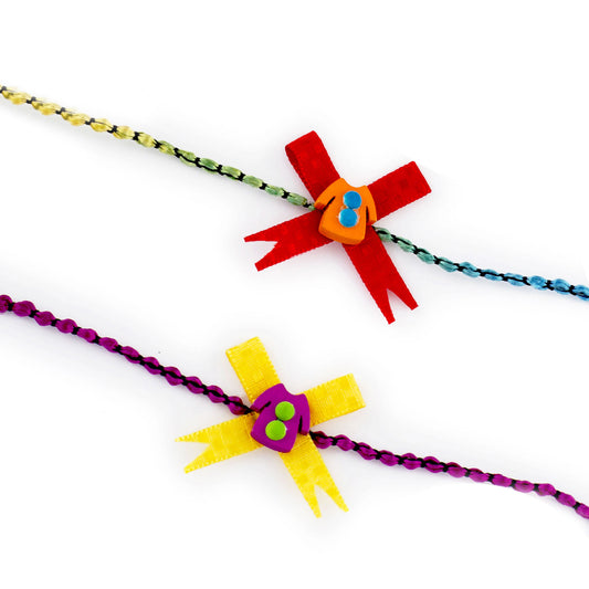 Aapno Rajasthan Set of 2 Yellow & Red Dress Motif Kids Rakhi - Default Title (PST17261)