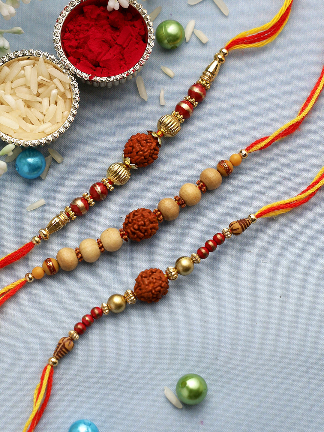 Rudraksh and Sandalwood Beads Rakhi set of Three - Only Rakhi (PST22721_3)