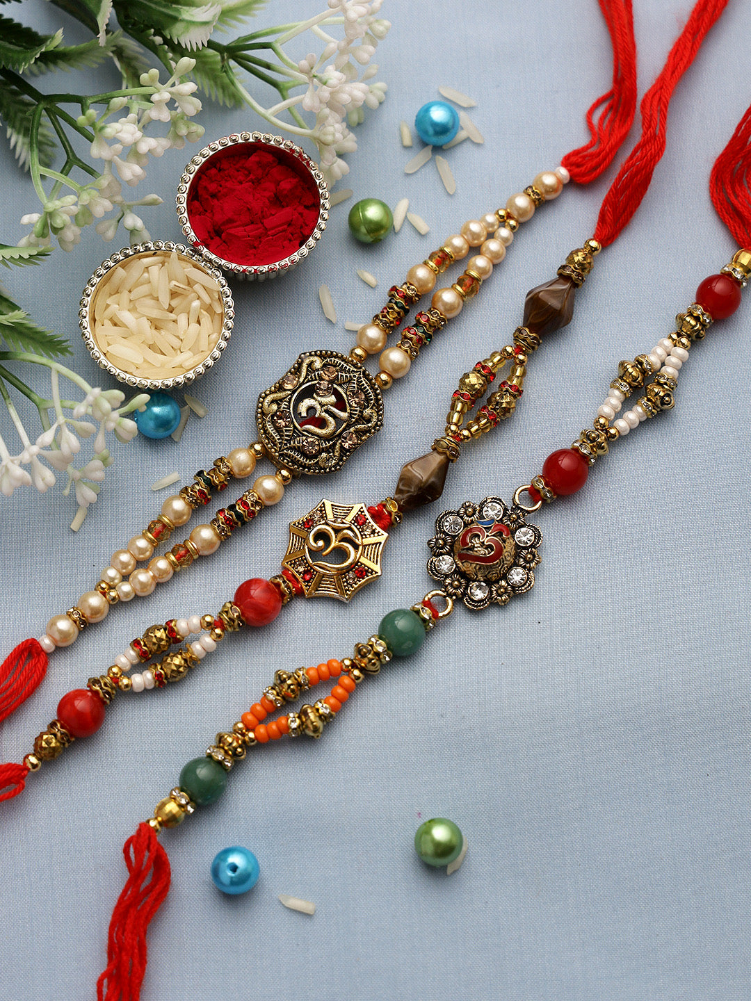 Traditional Golden OM Rakhi Set of Three - Only Rakhi (PST22726_3)