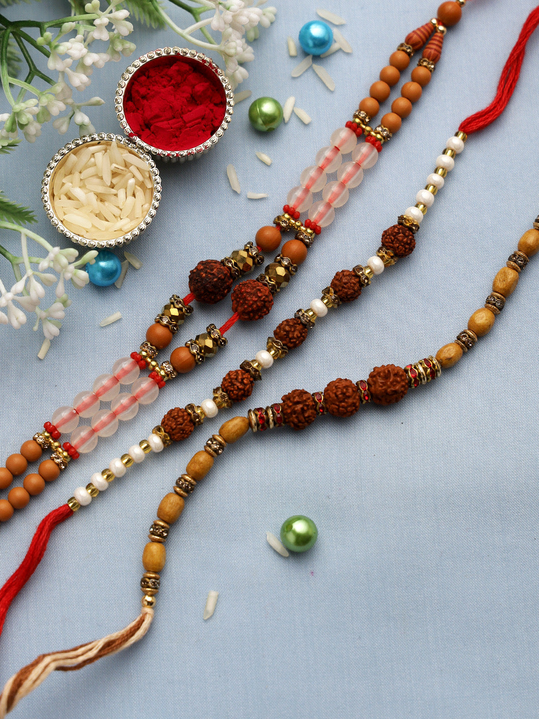 Auspicious Rudraksh and Beads Rakhi Set of Three - Only Rakhi (PST22727_3)