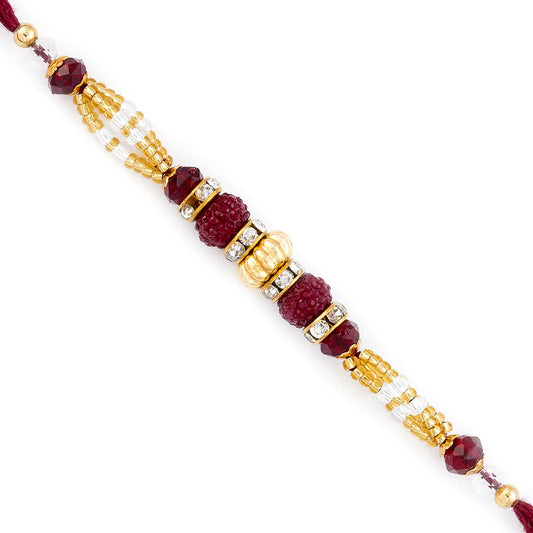 Aapno Rajasthan Golden & Magenta Beads Studded Beautiful Rakhi - Default Title (RB17609)