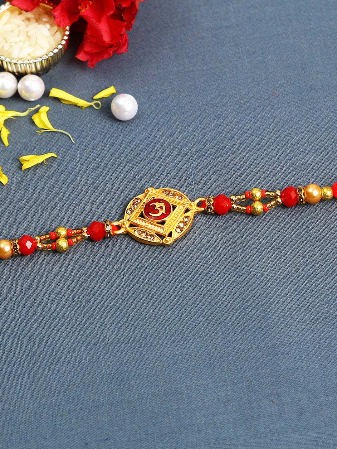 Meena work OM Rakhi with Golden Base and Beads - Only Rakhi (RJ22121)