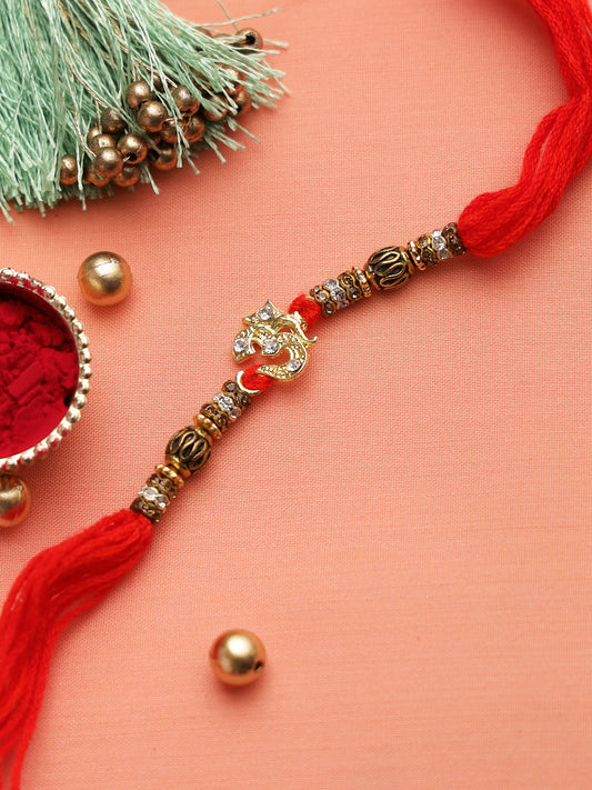 AD Studded OM Motif Rakhi with Rustic Golden Balls - Only Rakhi (RJ22125)