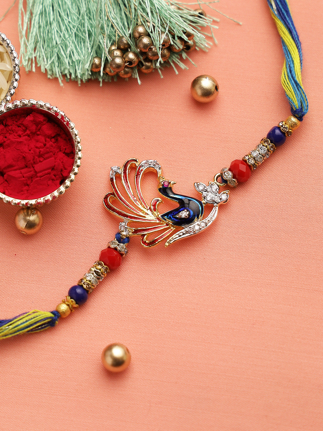 American Diamonds Peacock Motif Rakhi with Circular Beads - Only Rakhi (RJ22145)