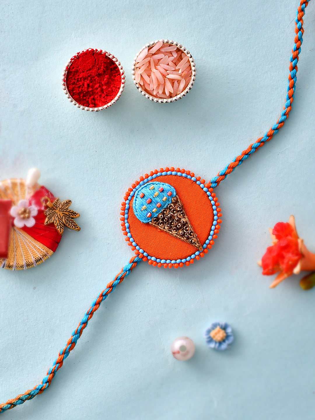 Mini Beads Embellished Quirky Cone Rakhi. - Only Rakhi (RK2331)