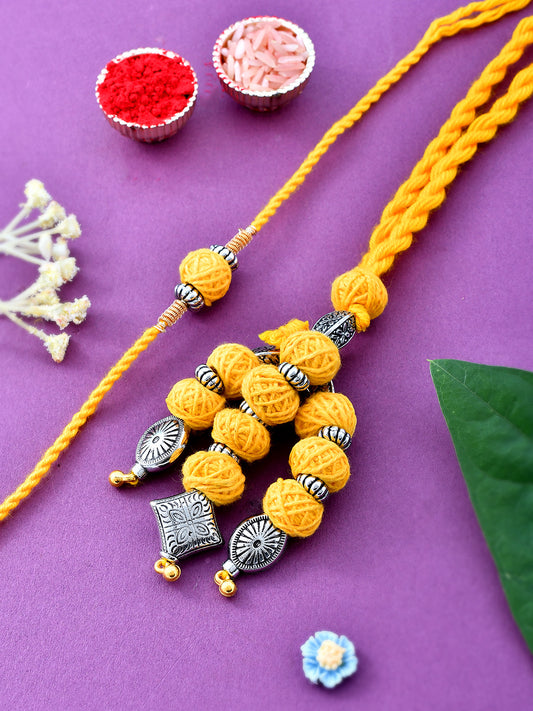 Silver & Wool Knitted Elegant Yellow Bhaiya Bhabhi Rakhi Set. - Only Rakhi (RP23111)