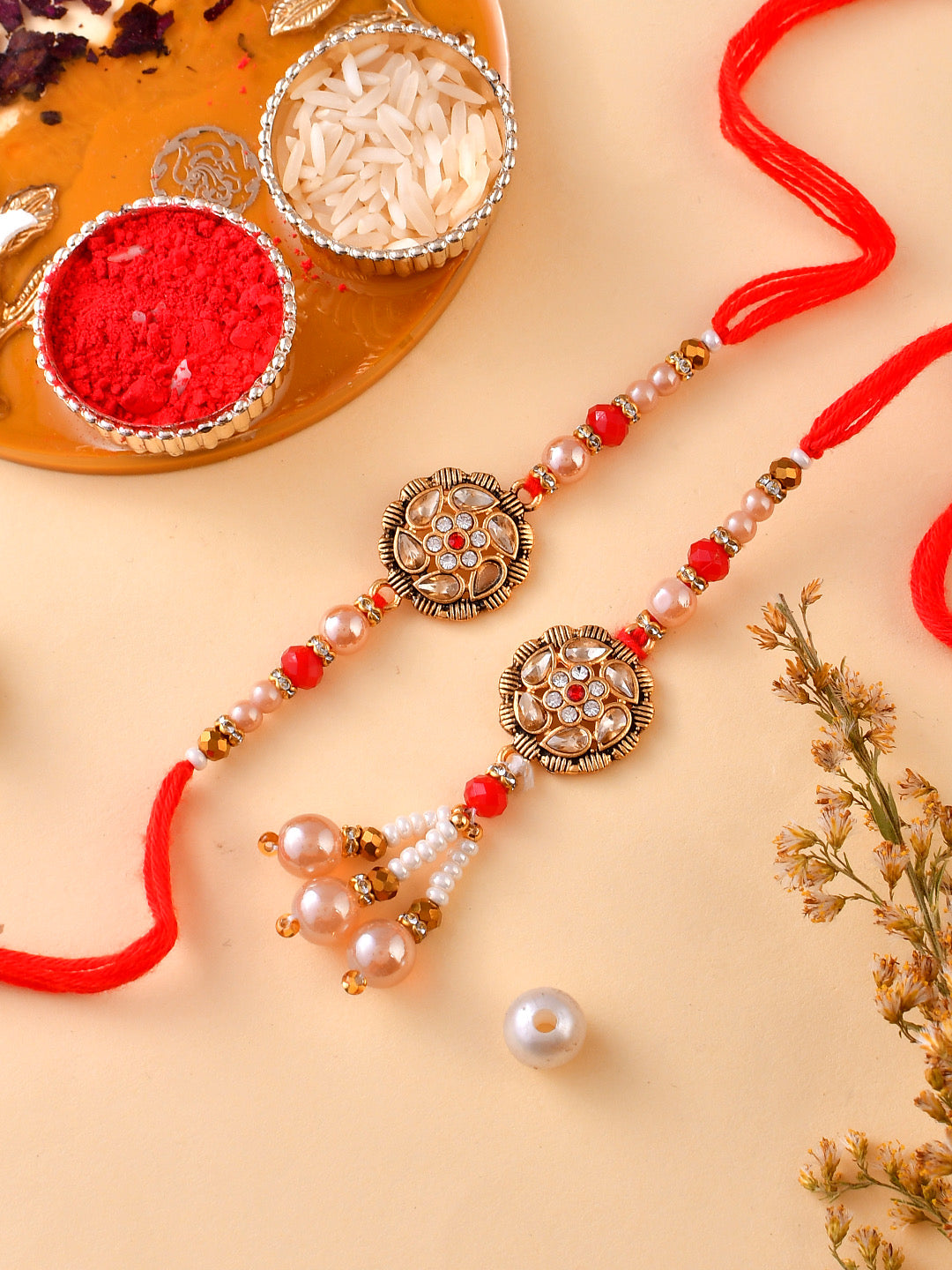 Red and Rose Gold Traditional Bhaiya Bhabhi Rakhi with Embellishments. - Only Rakhi (RP23136)